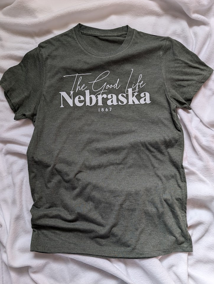 The Good Life Nebraska design on a green colored Small T Shirt