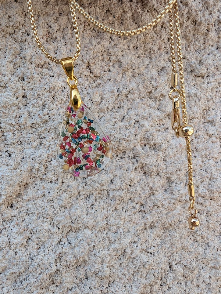 Teardrop multicolored mustard seed necklace with gold colored adjustable chain